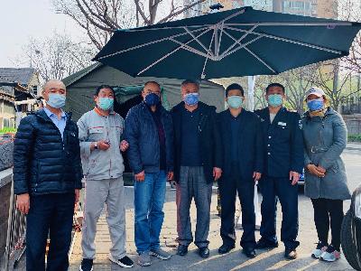 及时撑起遮阳伞  关爱防控最前线